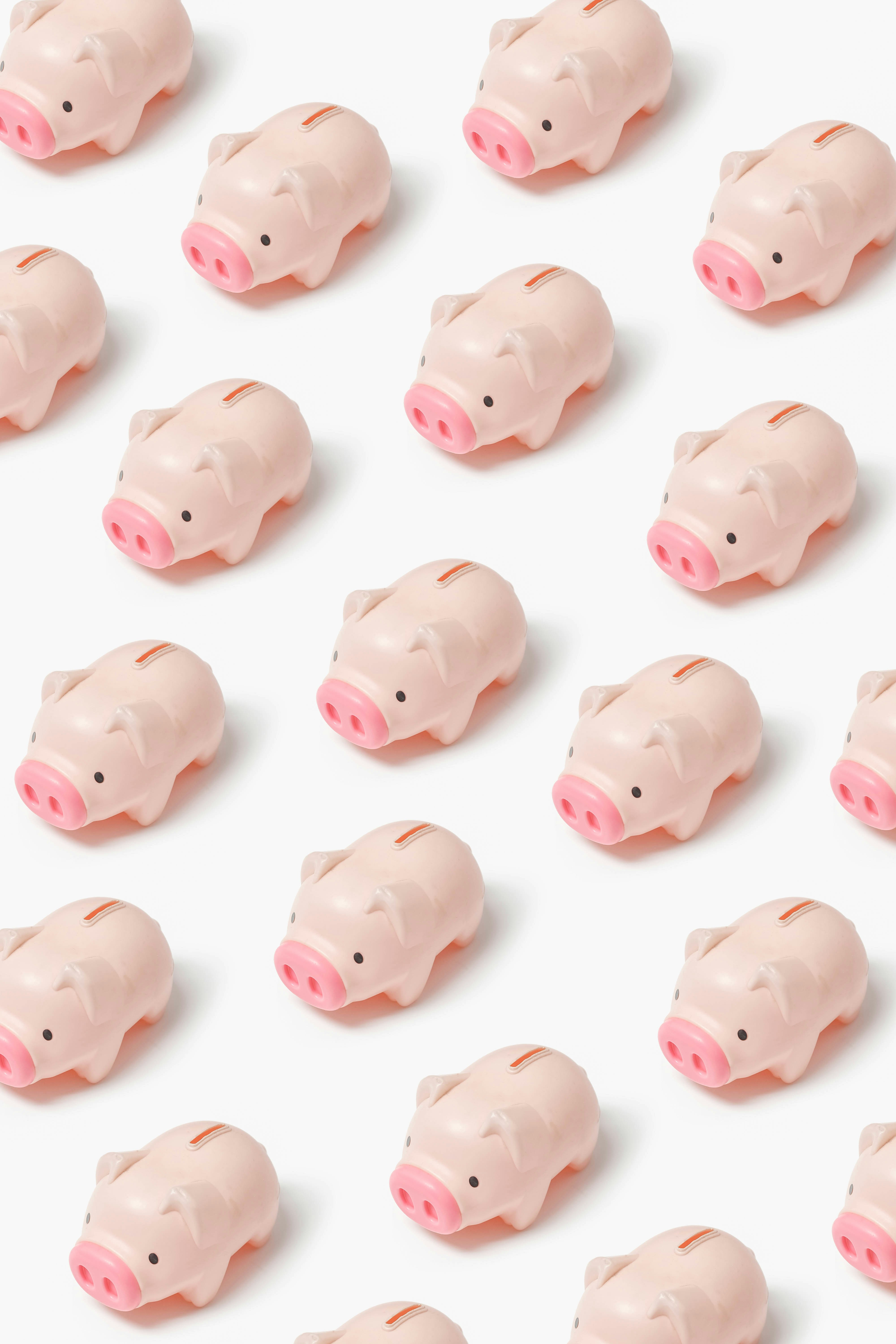 een beeld met allemaal roze varkens spaarpotjes